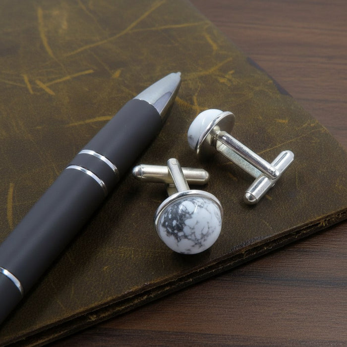 howlite cufflinks on notebook and pen