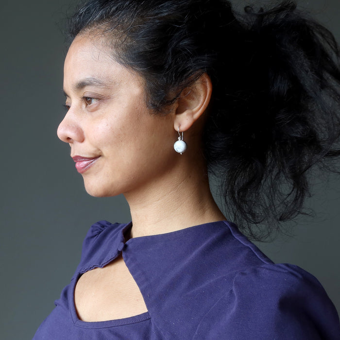 model wearing howlite sterling silver earrings