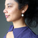 model wearing howlite sterling silver earrings