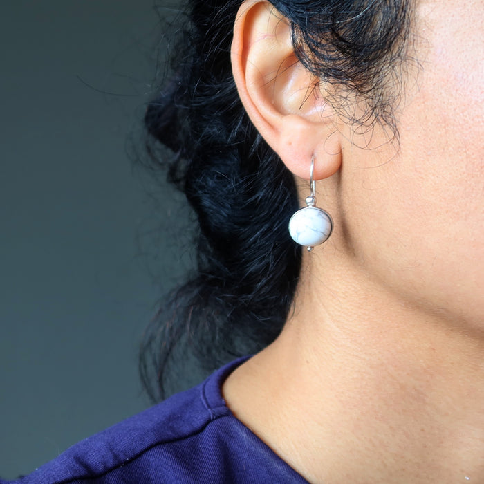 model wearing howlite sterling silver earrings