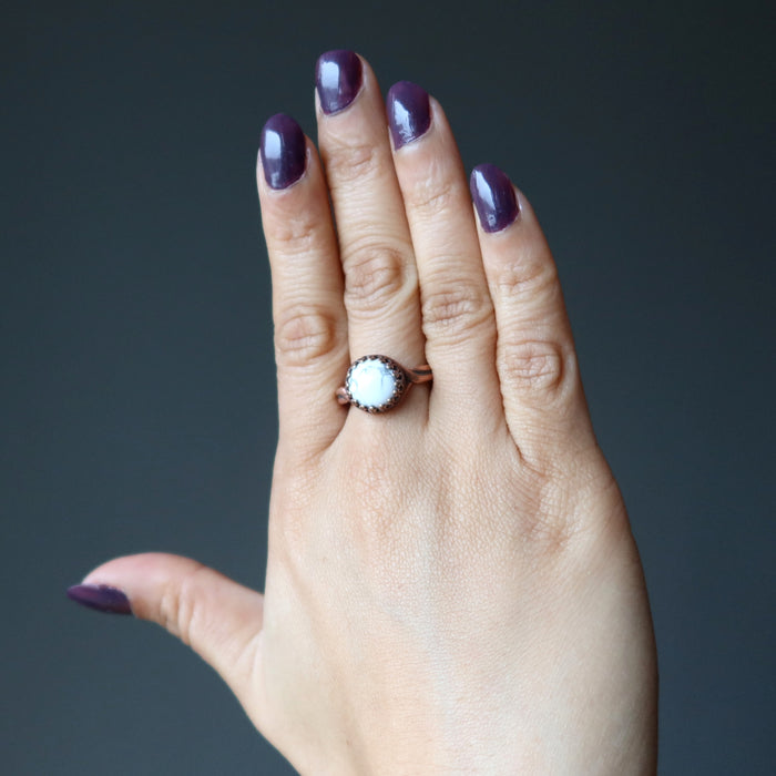 hand wearing howlite ring