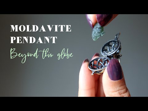 video featuring a moldavite pendant