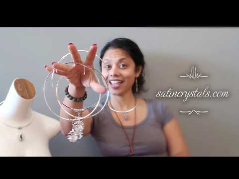 video featuring quartz cage necklaces