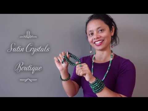 video on wearing dark green banded malachite round beaded stretch bracelet