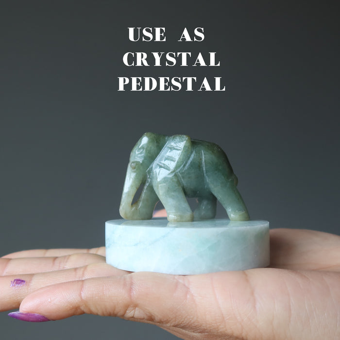 green jade polished circle charger with jade elephant on top