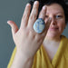 female model wearing big dendritic jasper ring