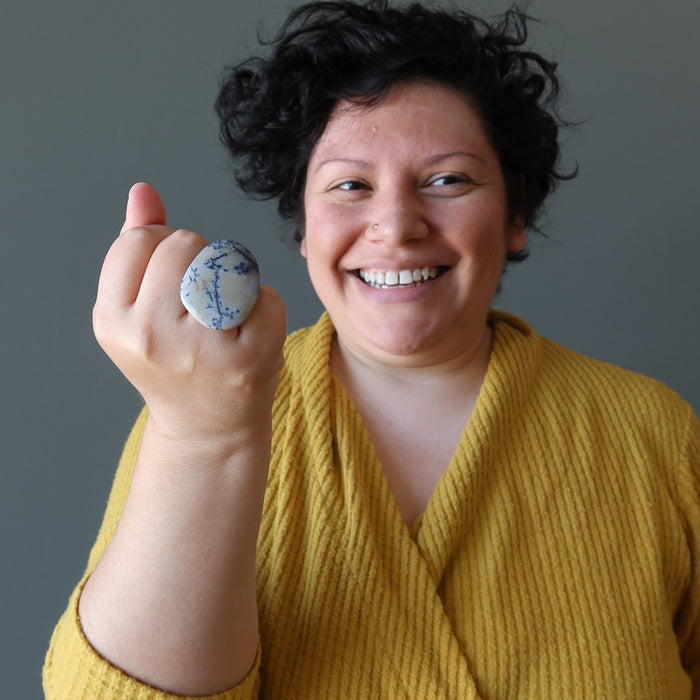 female model wearing dendritic jasper ring
