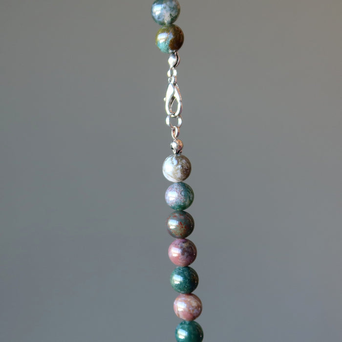 displaying lobster clasp of Earth Colors Round Bead Jasper Necklace