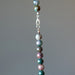 displaying lobster clasp of Earth Colors Round Bead Jasper Necklace