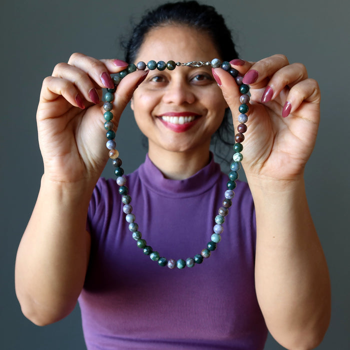 sheila of satin crystals holding Earth Colors Round Bead Jasper Necklace