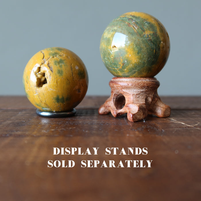 yellow ocean jasper spheres on ball stands