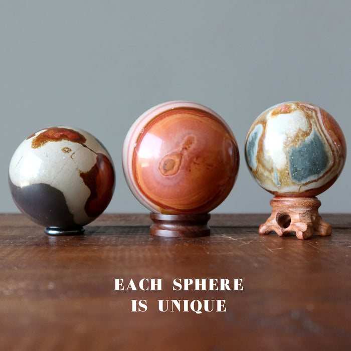 polychrome jasper spheres on wood stands