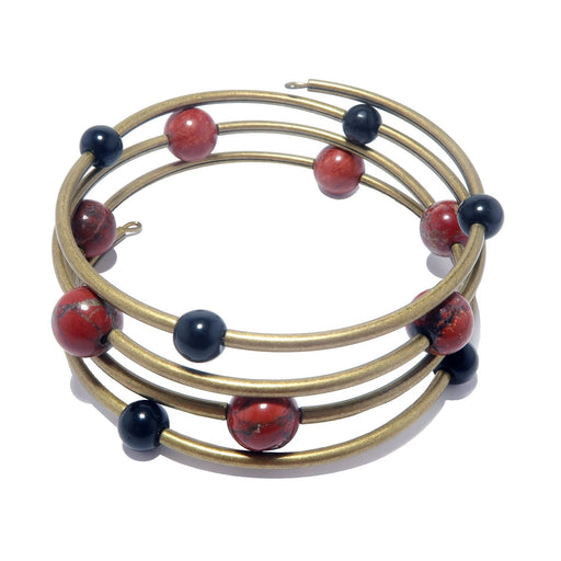 genuine red jasper and black obsidian stones beaded with antiqued gold plated brass beads on 4-coils of memory wire bracelet.