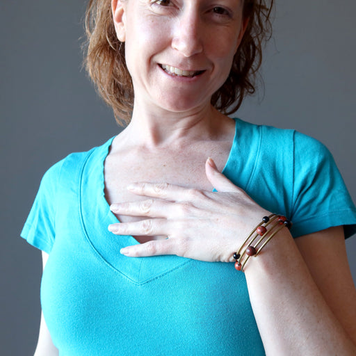 woman wearing jasper obsidian wire wrap bracelet