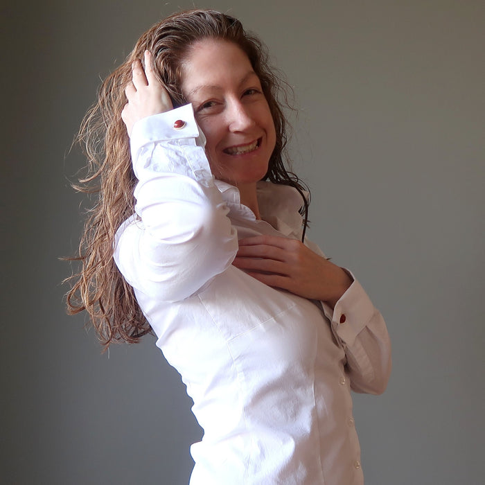 woman wearing red jasper cufflinks