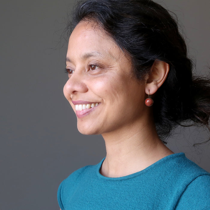 sheila of satin crystals wearing red jasper in antique bronze leverback earrings