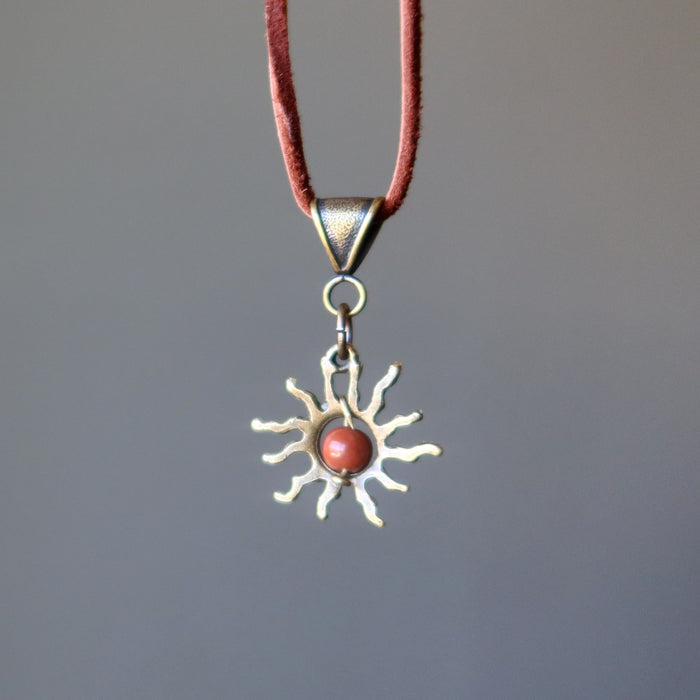 back of red jasper sun necklace