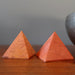 two red jasper pyramids