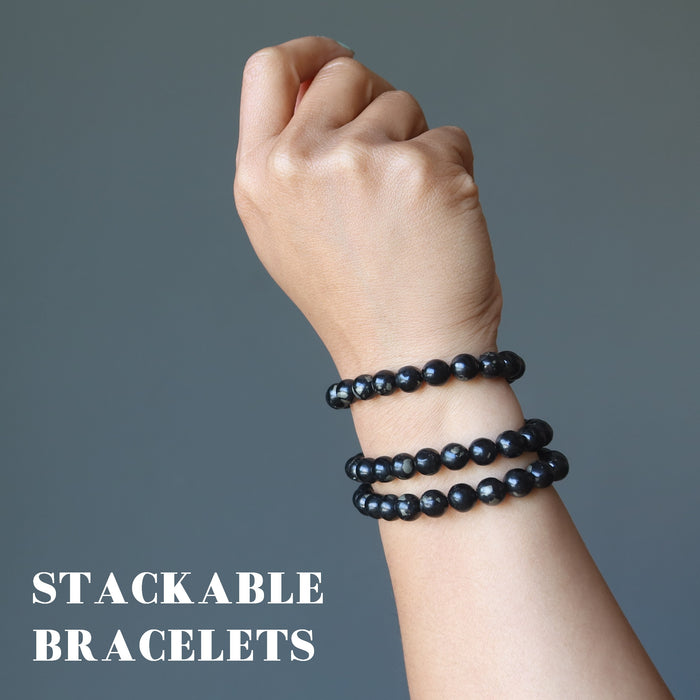 stack of three jet pyrite bracelets