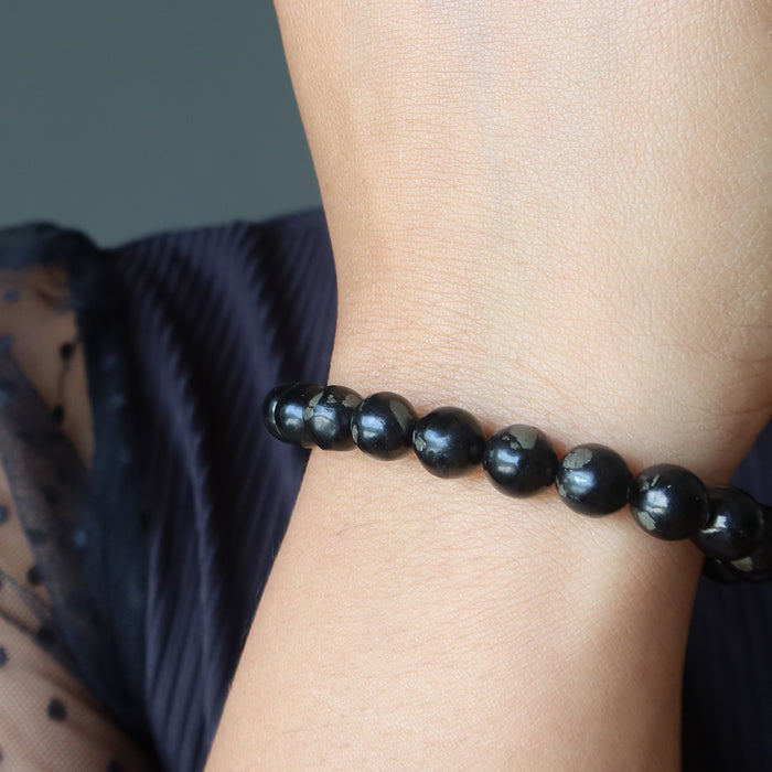 female wearing jet pyrite bracelet