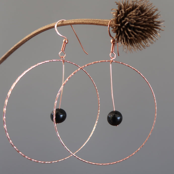  jet stones in big copper hoop earrings