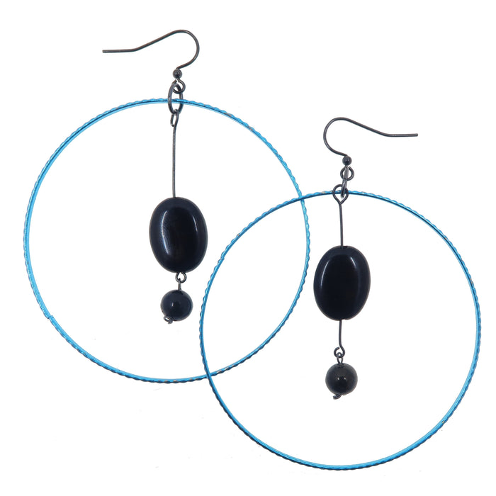 A pair of blue-plated steel hoop earrings with black jet stones, designed in an oval and round shape, suspended from gunmetal-plated brass wires.