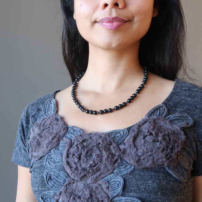 sheila of satin crystals wearing a black jet stone beaded necklace