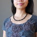 sheila of satin crystals wearing a black jet stone beaded necklace