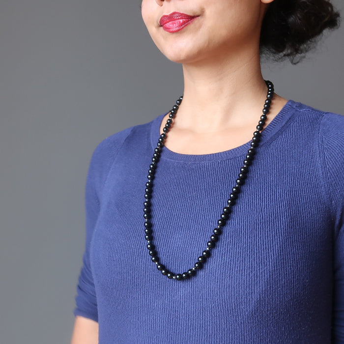sheila of satin crystals wearing a black jet stone beaded necklace