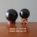 jet stone spheres on ball stands