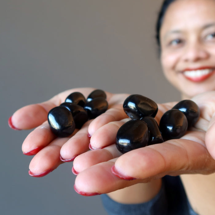 sheila of satin crystals with jet tumbled stones in each hand