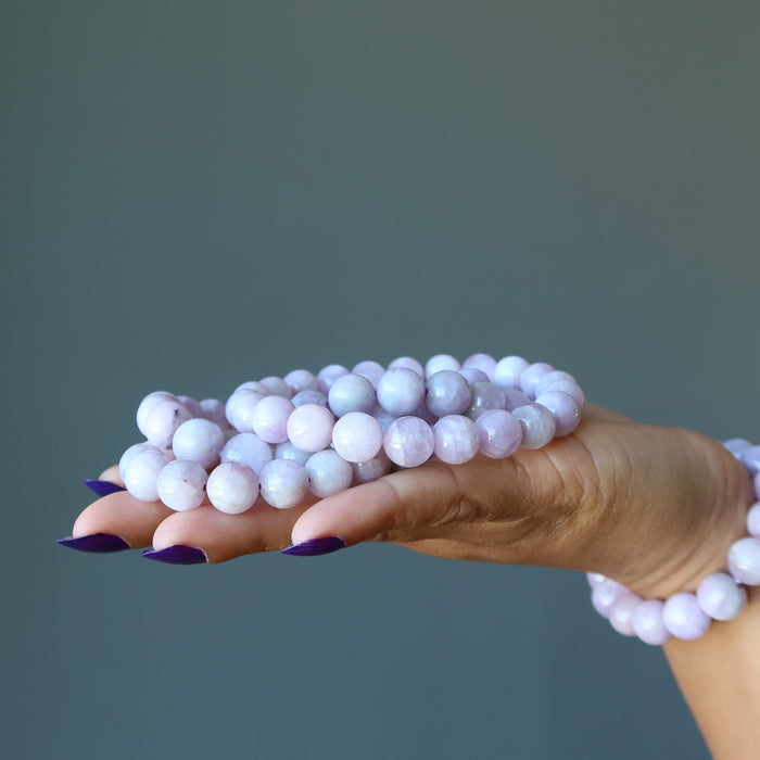 kunzite bracelets in hand