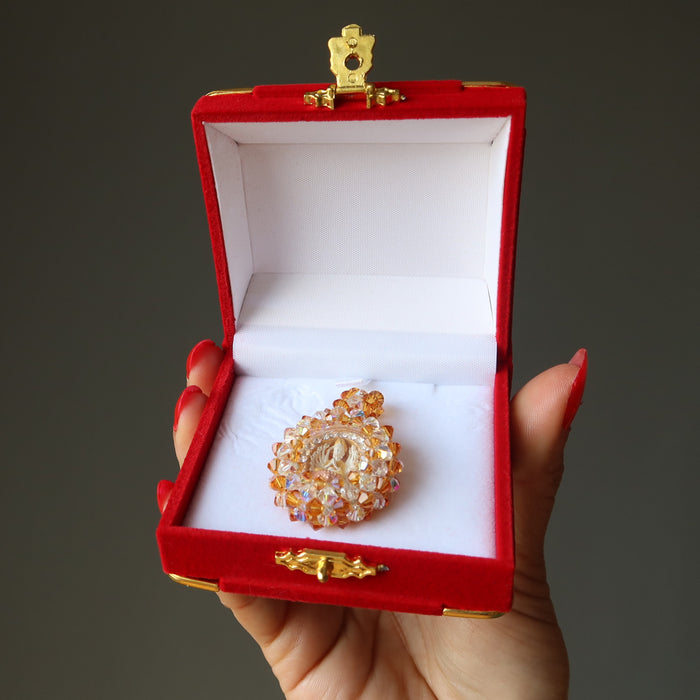 gold kwan yin pendant in case