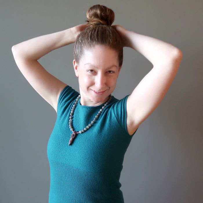 jamie of satin crystals wearing labradorite goddess necklace