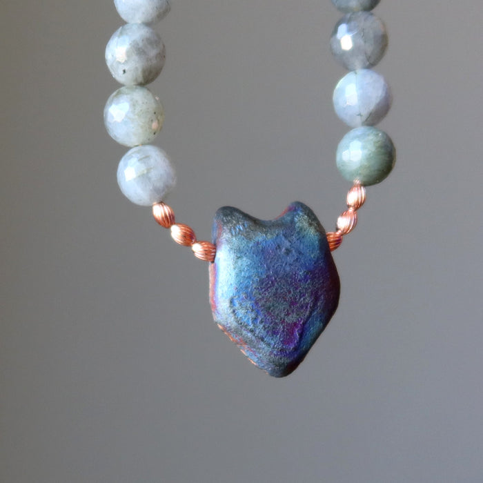 back of wolf head pendant on labradorite necklace