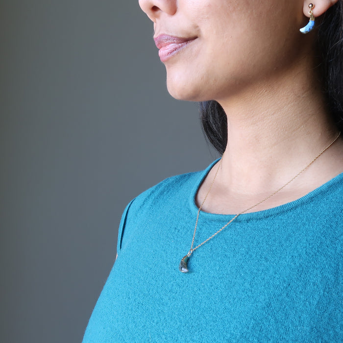 sheila of satin crystals wearing faceted labradorite crescent moon gold chain necklace