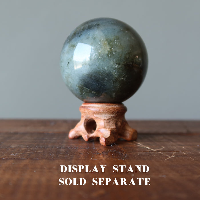labradorite crystal ball  on wood display stand