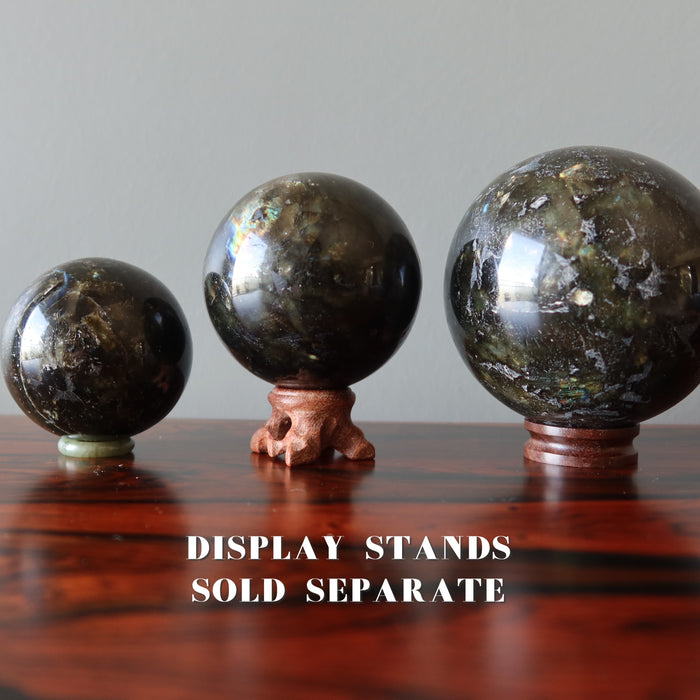 dark labradorite balls on wood stands