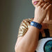 sheila of satin crystals wearing chunky lapis bracelet
