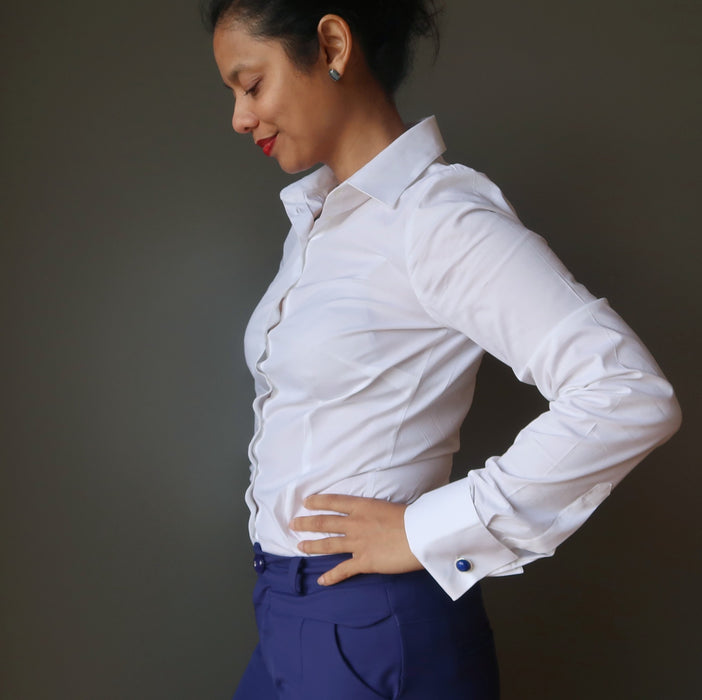 woman wearing lapis lazuli silver cufflinks on french cuffs