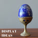 lapis egg on metal display stand