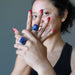 sheila of satin crystals wearing lapis pyramid rings