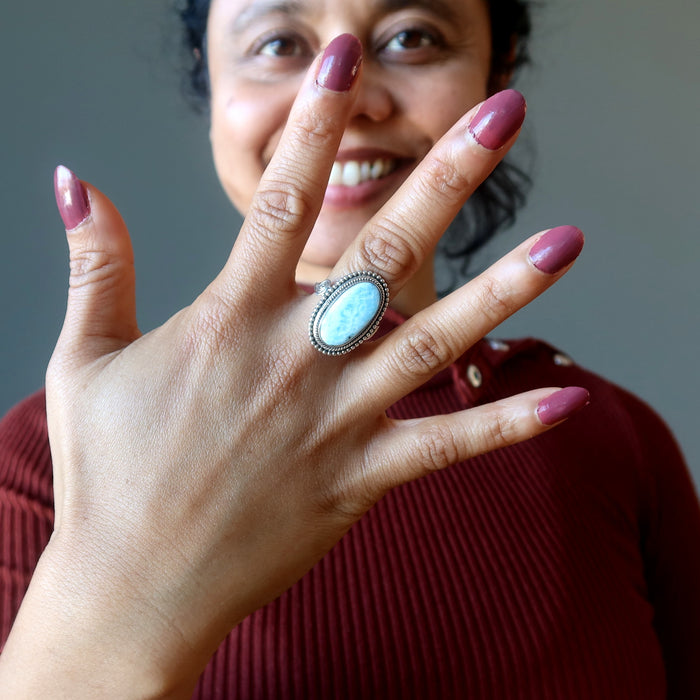 woman wearing larimar oval ring