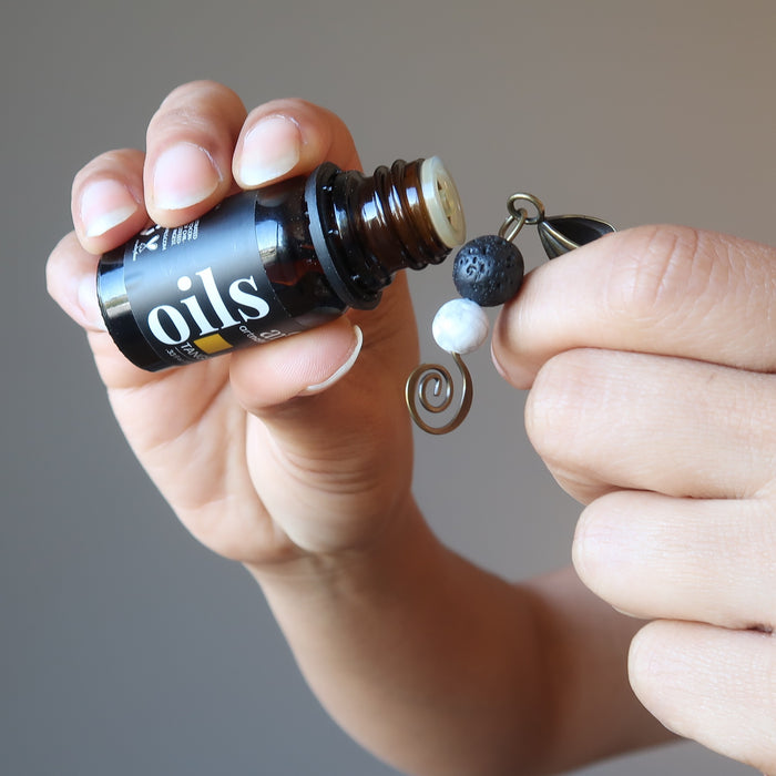 essential oil on lava howlite necklace