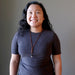 woman wearing lava howlite necklace