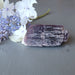 flowers and rough purple lepidolite on white quartz cluster