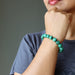 woman wearing malachite bracelet
