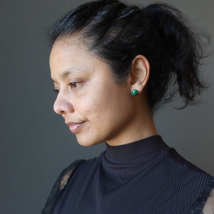 woman modeling malachite stud earrings