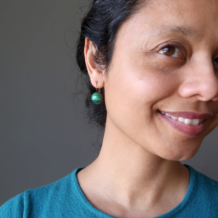 sheila of satin crystals wearing malachite bronze leverback earrings 