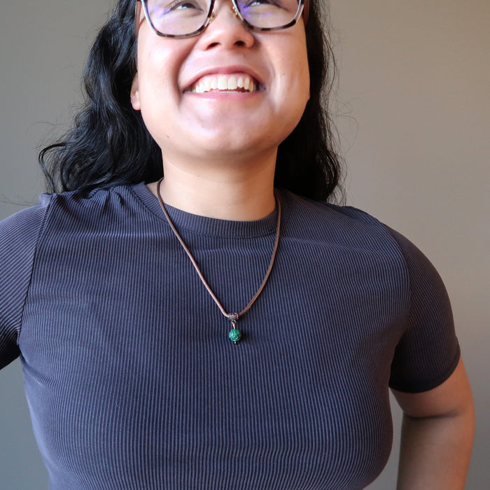 model wearing malachite necklace